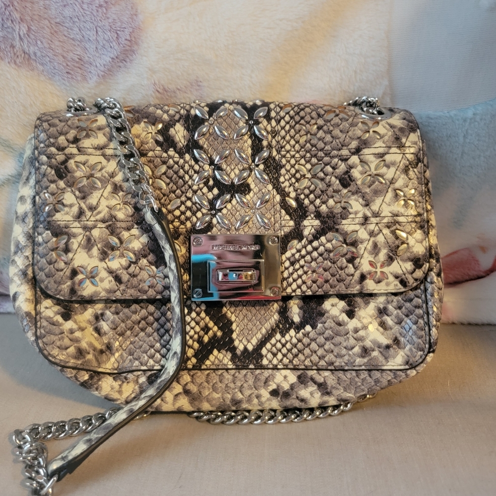 Micheal Kors snake skin design purse